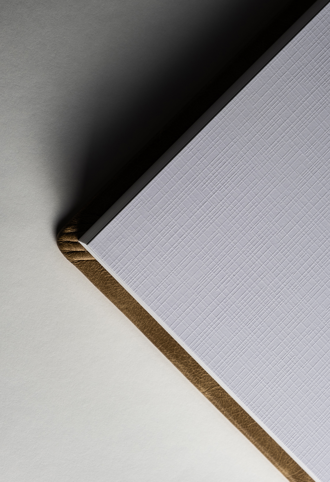 Corner of a thick wedding album page