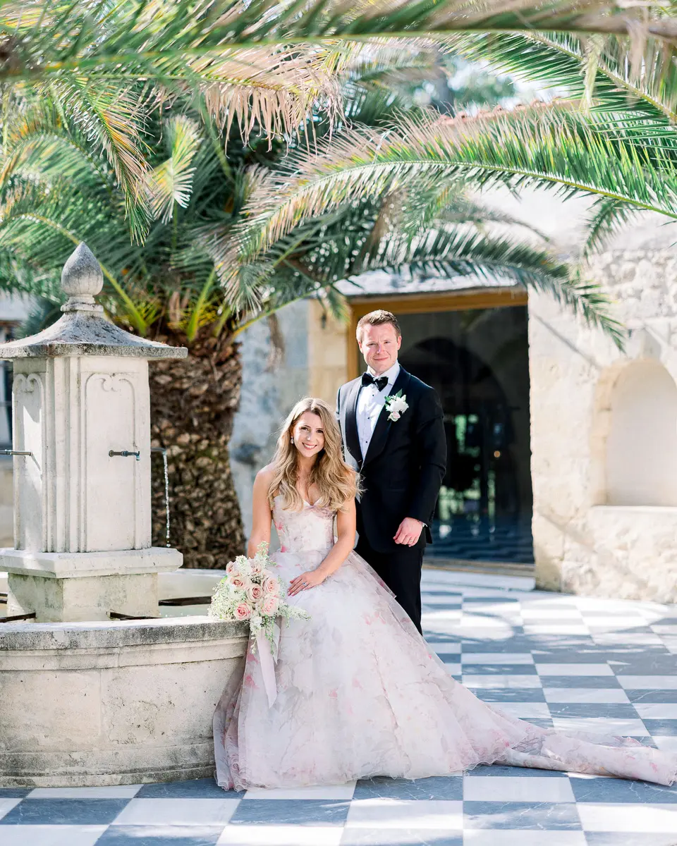 Elegant wedding couple at a château in France captured in fine art natural light photography
